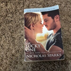 The Lucky One by Nicholas Sparks Paperback - White, Tan, Black